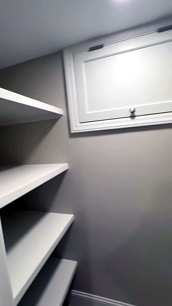 Built-in closet shelving in a finished basement room in Eastover, Charlotte
