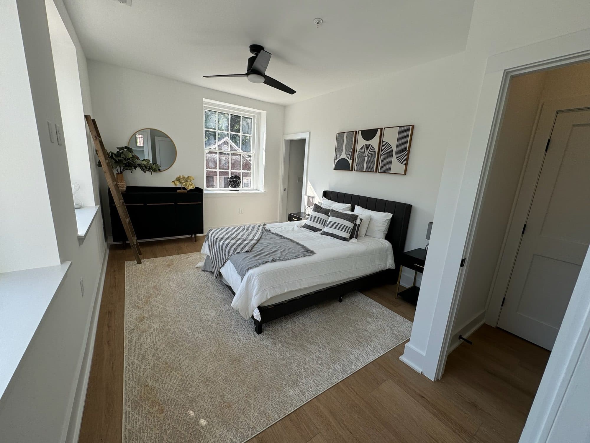 Bedroom with LVP flooring and fresh paint at The Arches townhomes, Charlotte NC